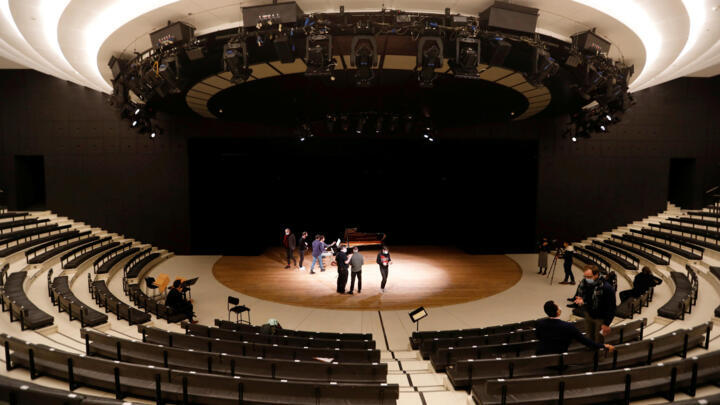 Singers and musicians, members of the Opera de Paris Academy, rehearse at the Bastille Opera in Paris as French theatres, cinemas and museums which have been on Covid-19 lockdown will not reopen this year in France, December 11, 2020.